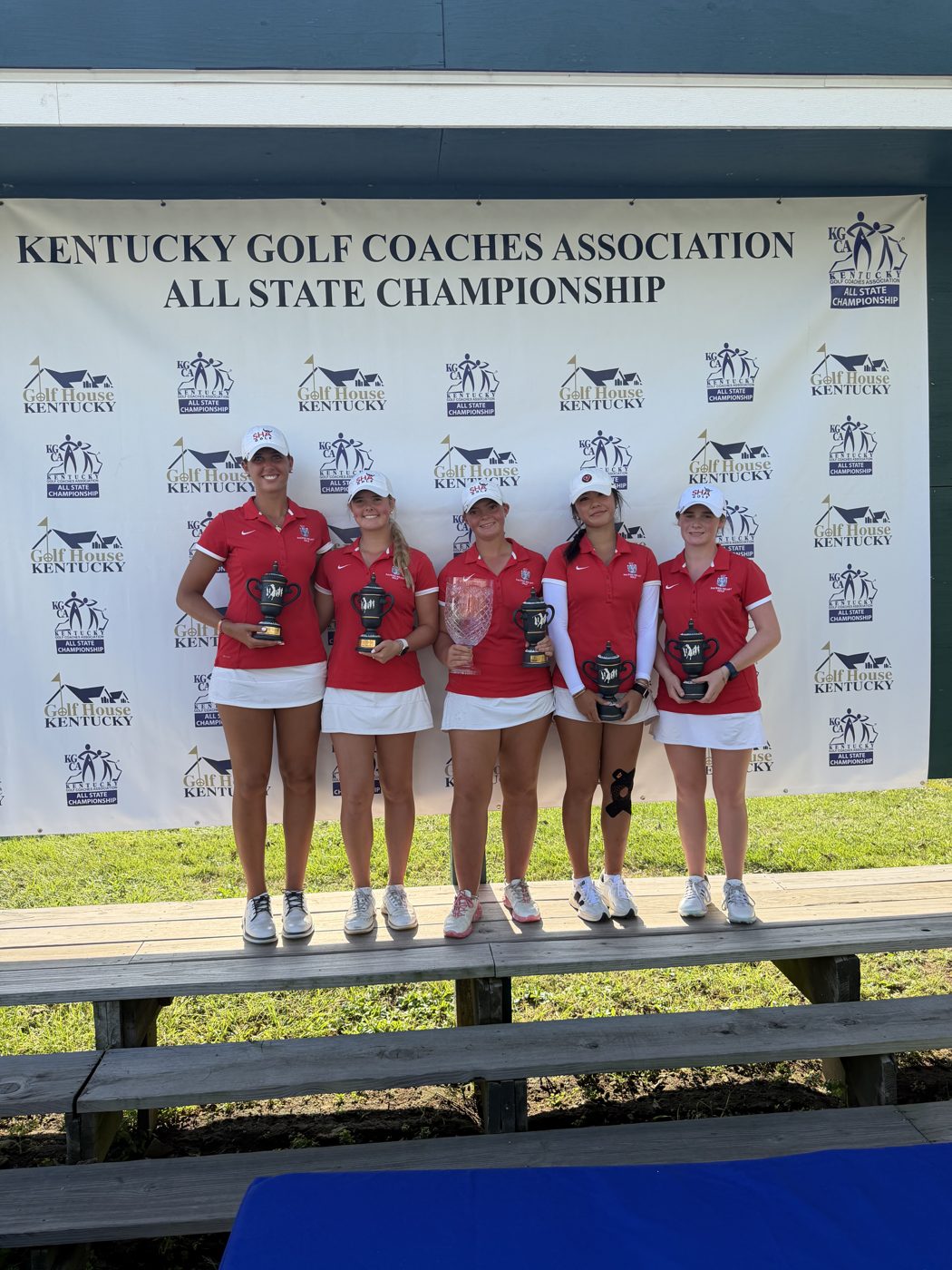 Sacred Heart team with trophies at the KGCA All-State Championship